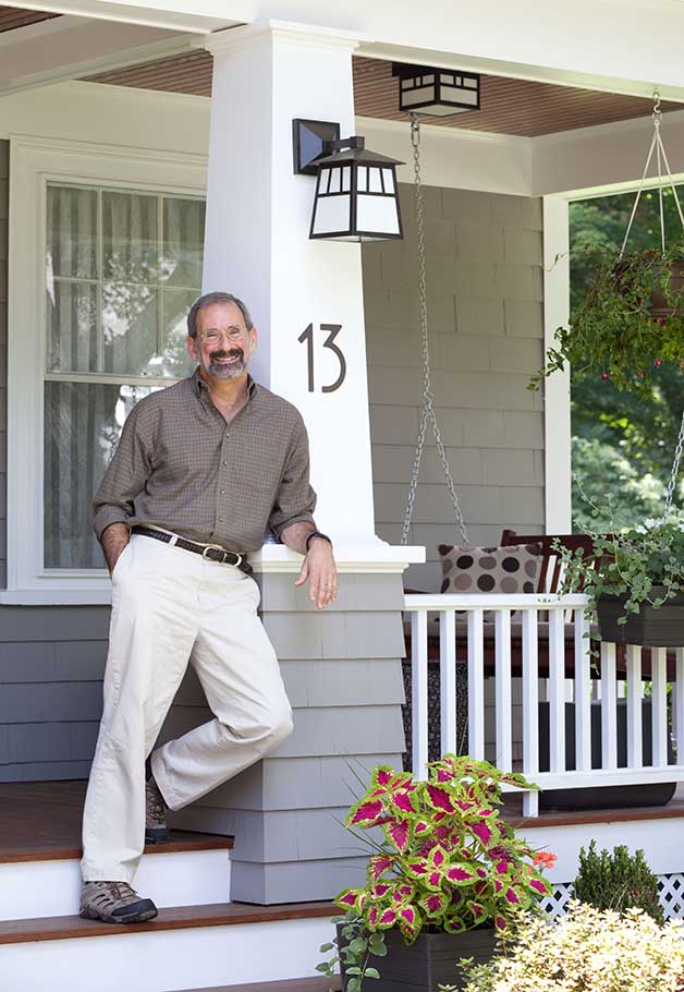 Philip Kramer, Architect, leaning on column